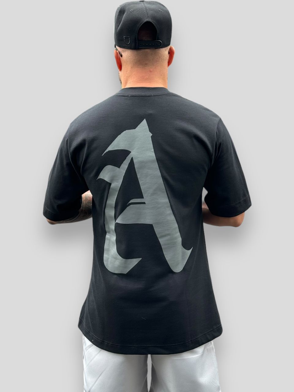 Camiseta Oversized Ayudarme Preta