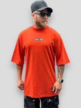 Camiseta Oversized Nóis É Nóis Laranja